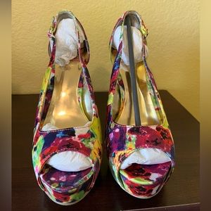 Open toe high heels by Material Girl